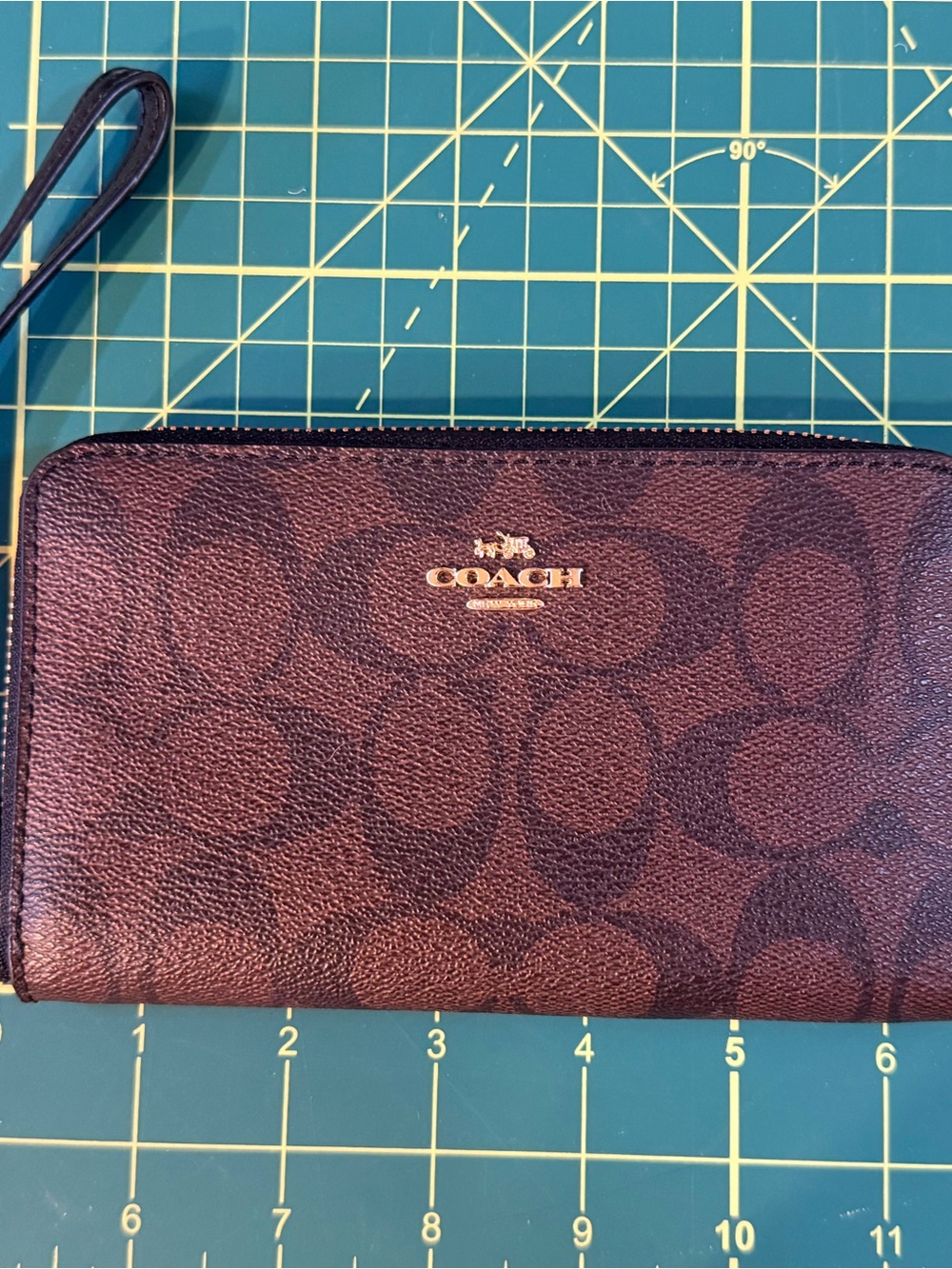 Coach Signature Zip Wristlet in Dark Brown with Gold Logo